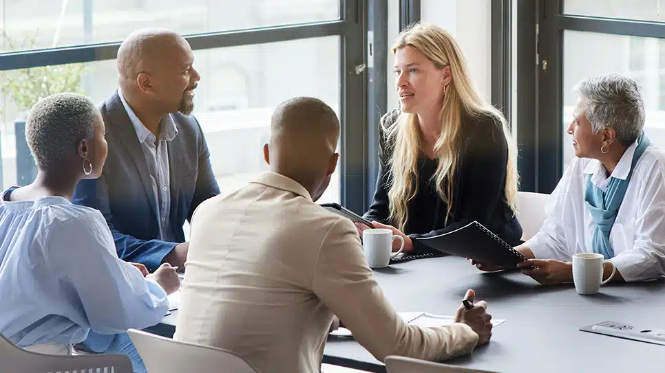 group of workers at conference table