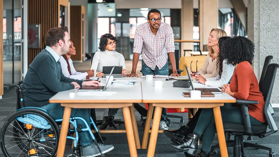 diverse group of office colleagues in a meeting room