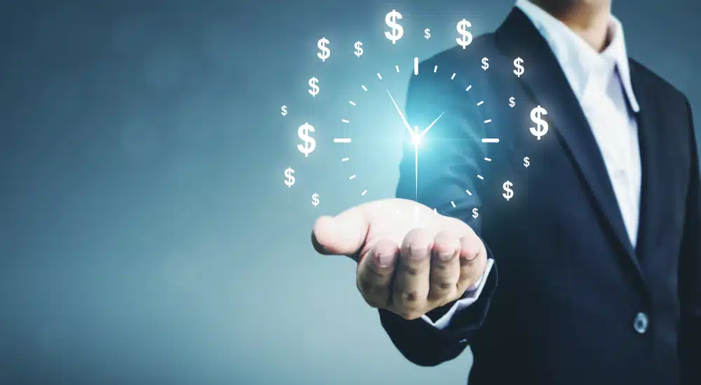 Businessman,Holding,Sign,Clock.,Concept,Business,Time,Is,Money