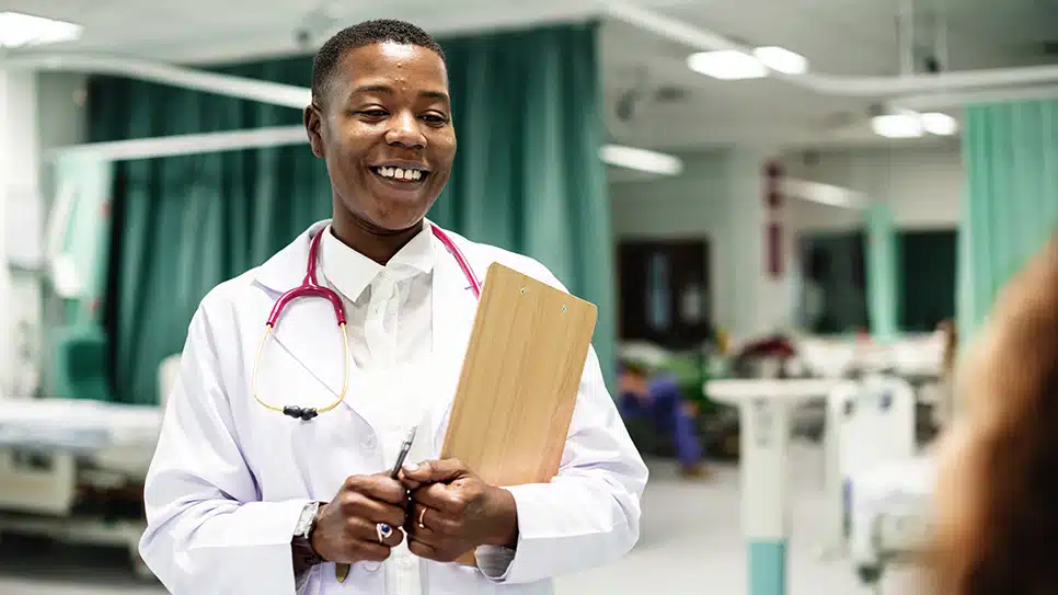 Doctor talking to her patient in the hospital