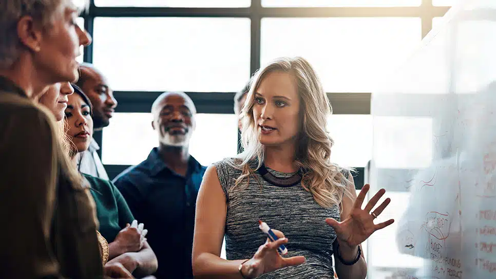 Dividing her responsibilities between her team before maternity leave