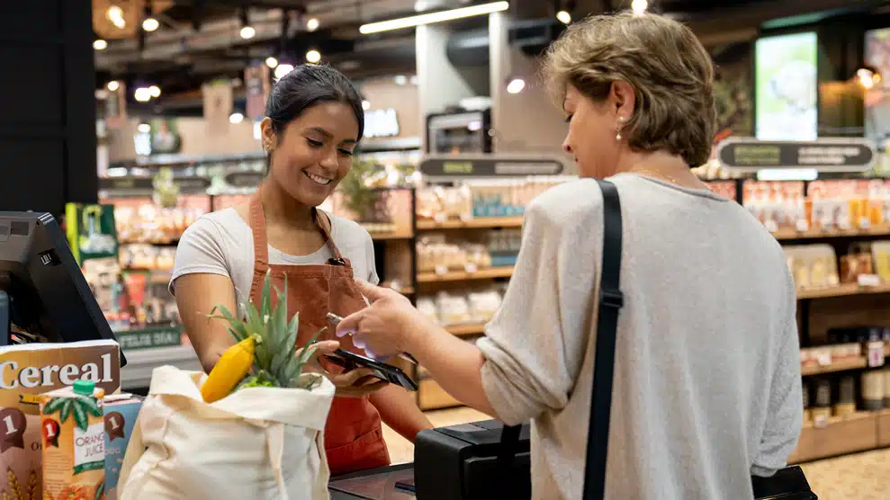 customer and employee interacting in a retail store